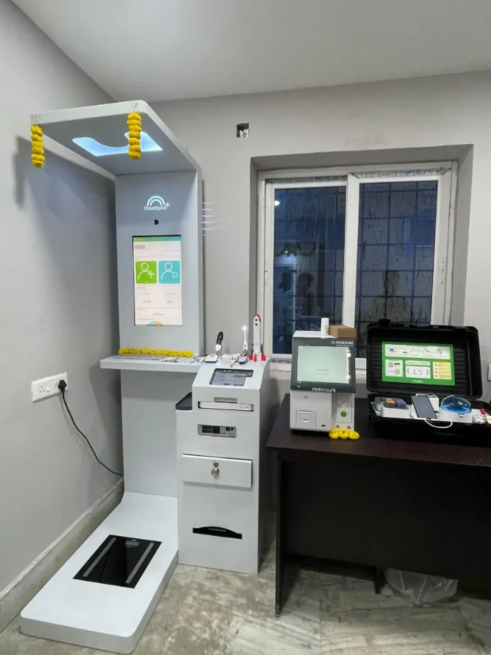 Arc Max Health ATM decorated with marigold garlands on installation day